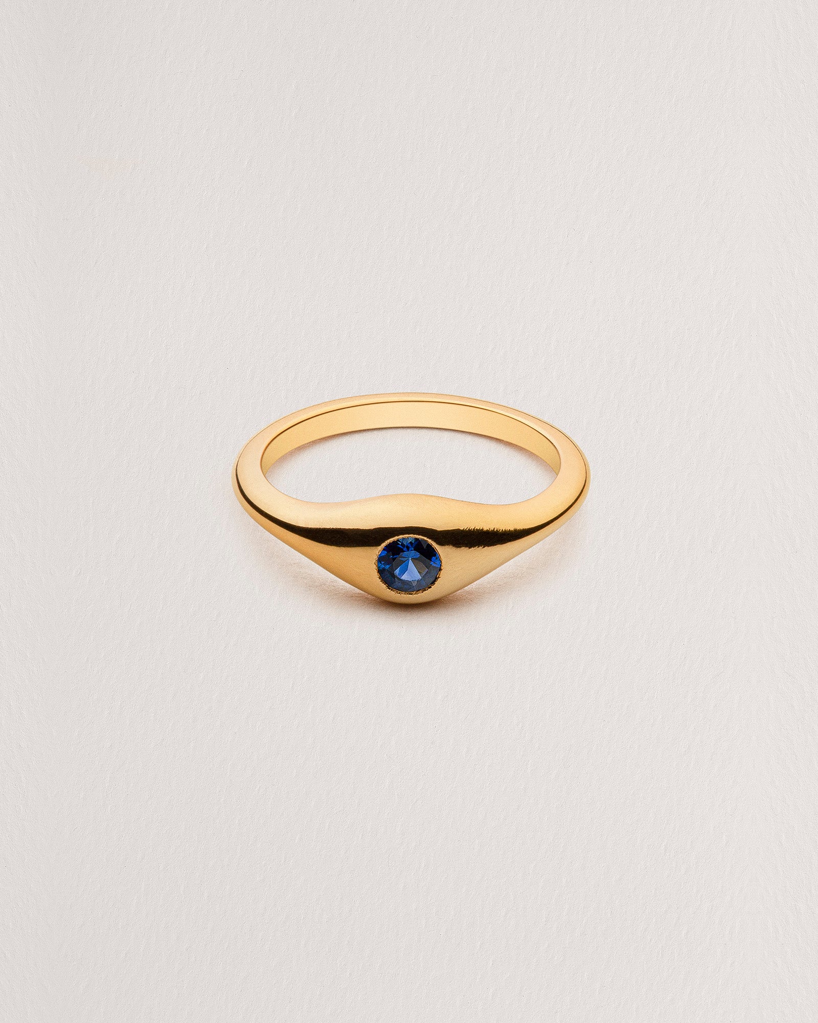 Rebecca Chaudhry 18ct Yellow Gold Tapered Blue Sapphire Signet Ring R03 Front